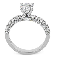 This engagement ring is sure to shine, with a classic straight design set with .75 ctw of white side diamonds.