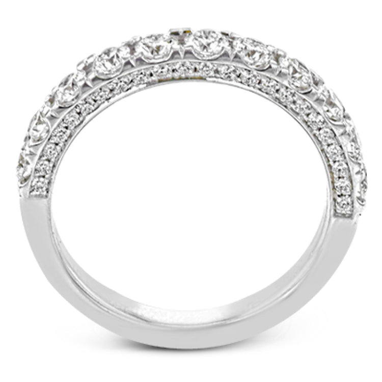 This engagement ring is stunning from every side, with .97 ctw of white round diamonds on the top and sides of the ring.
