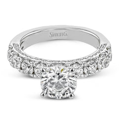 This engagement ring makes a statement with 1.39 ctw of side diamonds that shine from the top ad sides of the ring.