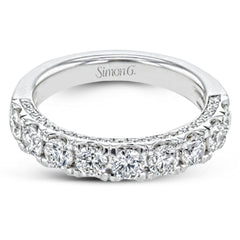 This engagement ring makes a statement with 1.39 ctw of side diamonds that shine from the top ad sides of the ring.