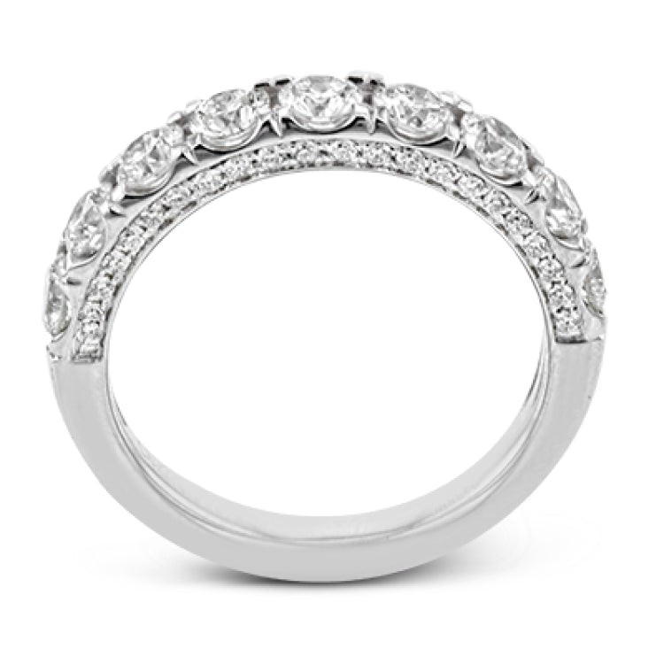 This engagement ring makes a statement with 1.39 ctw of side diamonds that shine from the top ad sides of the ring.