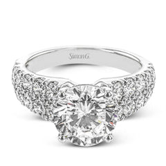 This bold engagement ring contains 1.50 ctw of side diamonds and will be sure to draw anyone's eyes with its modern design.