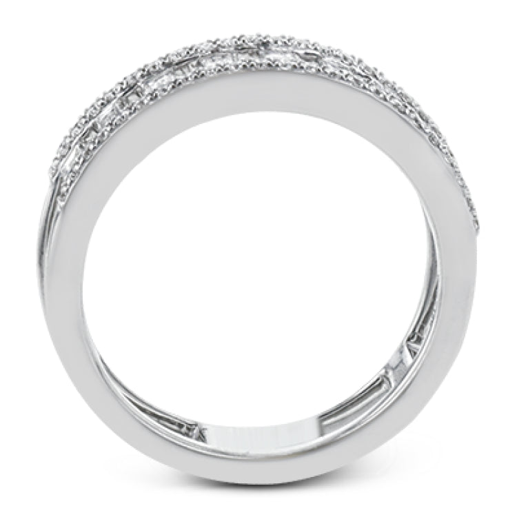 Baguette diamonds stand to attention and create and architectural effect in this unique 18k white gold ring design.