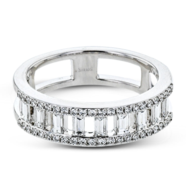 Baguette diamonds stand to attention and create and architectural effect in this unique 18k white gold ring design.
