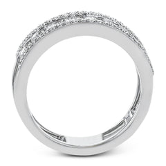 Baguette diamonds stand to attention and create and architectural effect in this unique 18k white gold ring design.