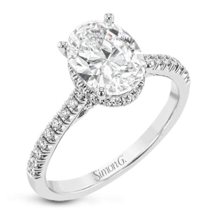 This 18k white gold engagement ring is perfect for an oval center stone, accented by .32 ctw of white diamonds.