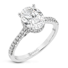 This 18k white gold engagement ring is perfect for an oval center stone, accented by .32 ctw of white diamonds.
