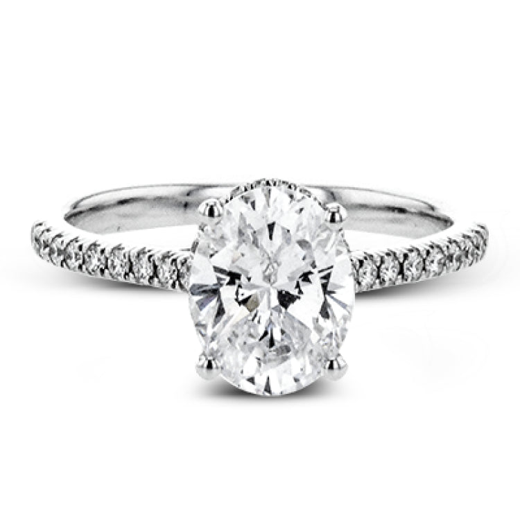 This 18k white gold engagement ring is perfect for an oval center stone, accented by .32 ctw of white diamonds.