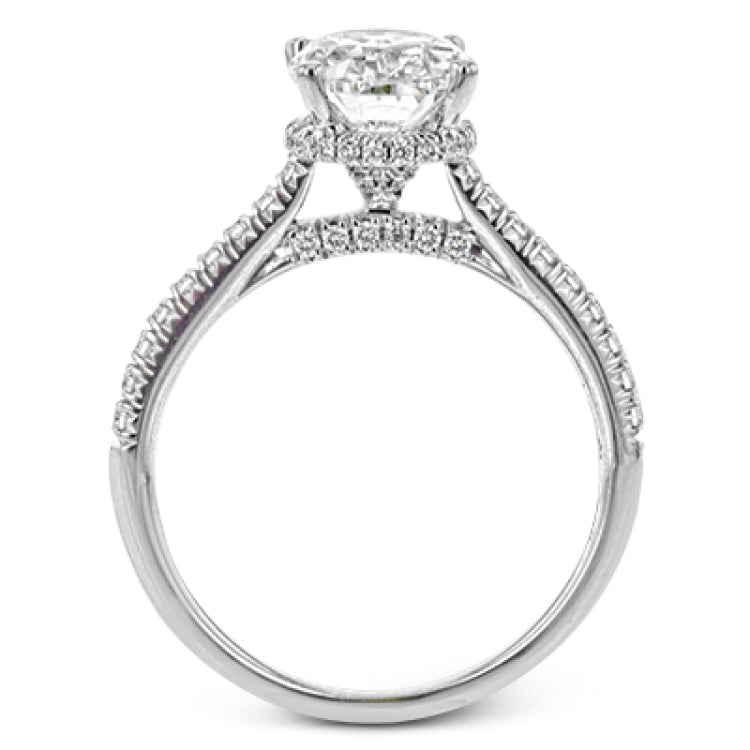 This 18k white gold engagement ring is perfect for an oval center stone, accented by .32 ctw of white diamonds.