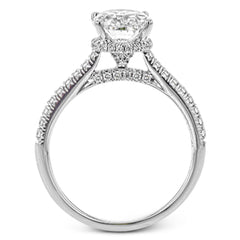 This 18k white gold engagement ring is perfect for an oval center stone, accented by .32 ctw of white diamonds.