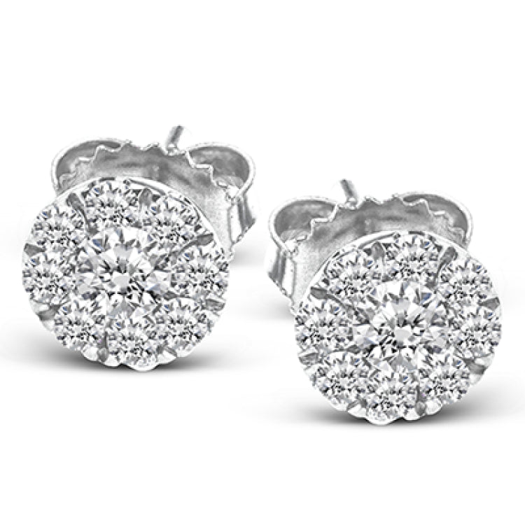 Set in 18K white gold and featuring .60cttw diamonds, these stud earrings are a staple in any jewelry wardrobe.