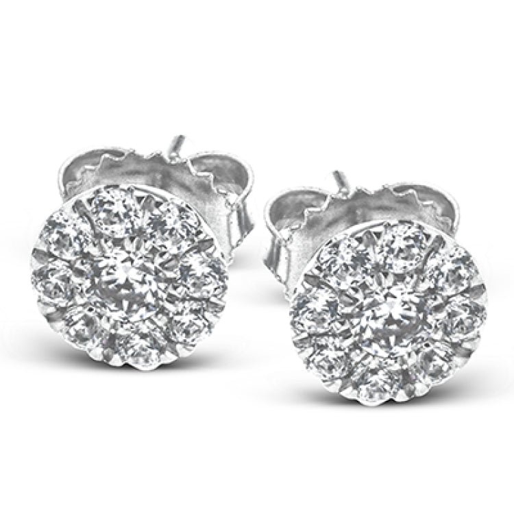 Set in 18K white gold and featuring .60cttw diamonds, these stud earrings are a staple in any jewelry wardrobe.