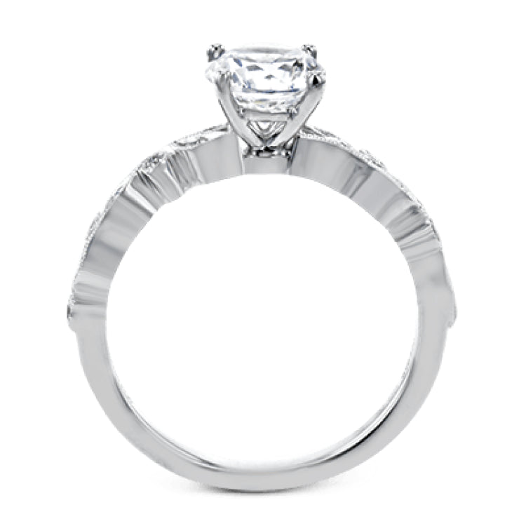 This beautiful two-tone 18k gold wedding set features an organic design white gold inner ring, with a yellow gold jacket surrounding it that is set with .22 ctw of yellow diamonds.