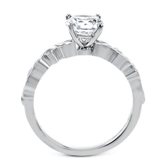 This beautiful two-tone 18k gold wedding set features an organic design white gold inner ring, with a yellow gold jacket surrounding it that is set with .22 ctw of yellow diamonds.