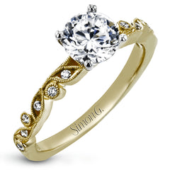 This beautiful two-tone 18k gold wedding set features an organic design white gold inner ring, with a yellow gold jacket surrounding it that is set with .22 ctw of yellow diamonds.