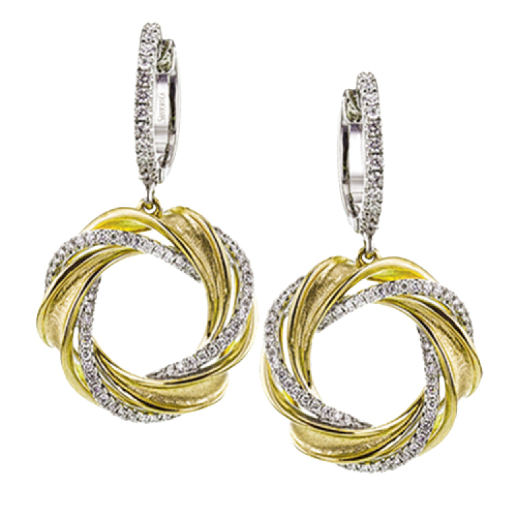 A wreath of gold and diamonds hang from the ear in these lovely earrings that combine 18k yellow and white gold.