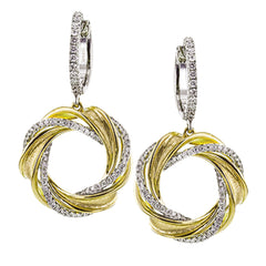 A wreath of gold and diamonds hang from the ear in these lovely earrings that combine 18k yellow and white gold.