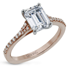 Simple yet stunning, this graceful engagement ring is made for an emerald cut center stone and is set with .16 ctw of white diamonds.