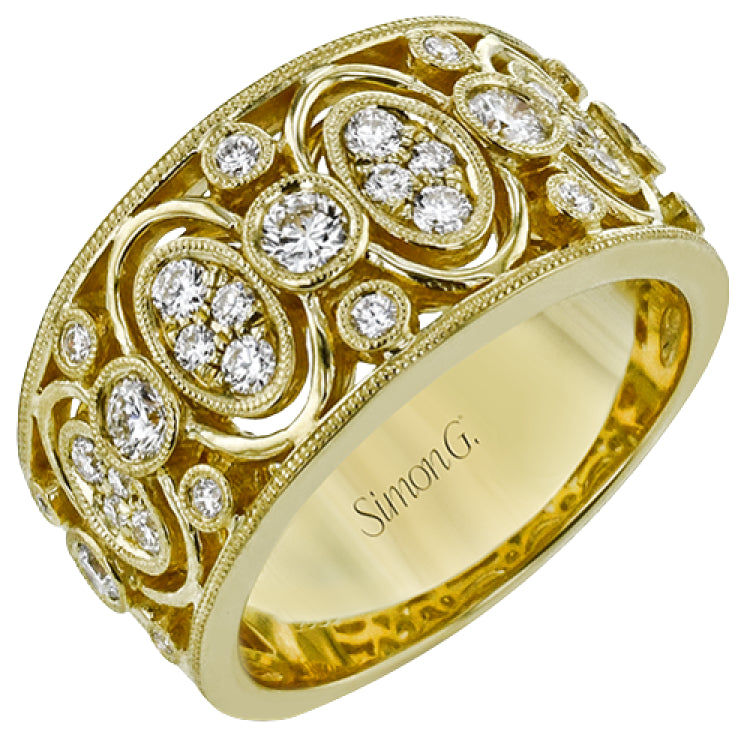This 18K yellow gold wide right hand ring features clusters of whte diamonds 0.39ctw encircled in gold and 0.24 ctw of bezel set diamonds