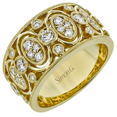 This 18K yellow gold wide right hand ring features clusters of whte diamonds 0.39ctw encircled in gold and 0.24 ctw of bezel set diamonds