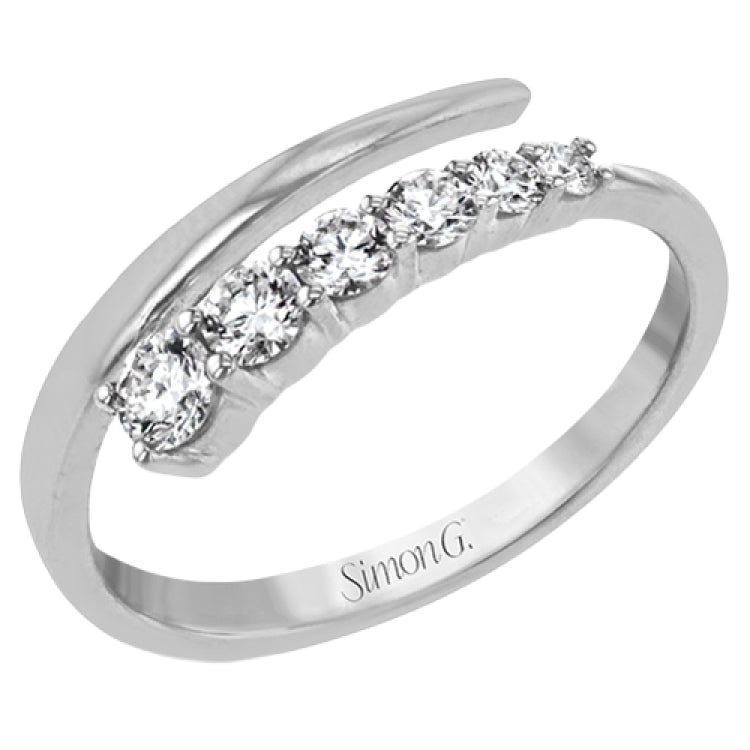 This dynamic 18k gold ring adds the perfect accent to any outfit with .38 ctw of diamonds in a graduated line.