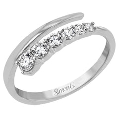 This dynamic 18k gold ring adds the perfect accent to any outfit with .38 ctw of diamonds in a graduated line.