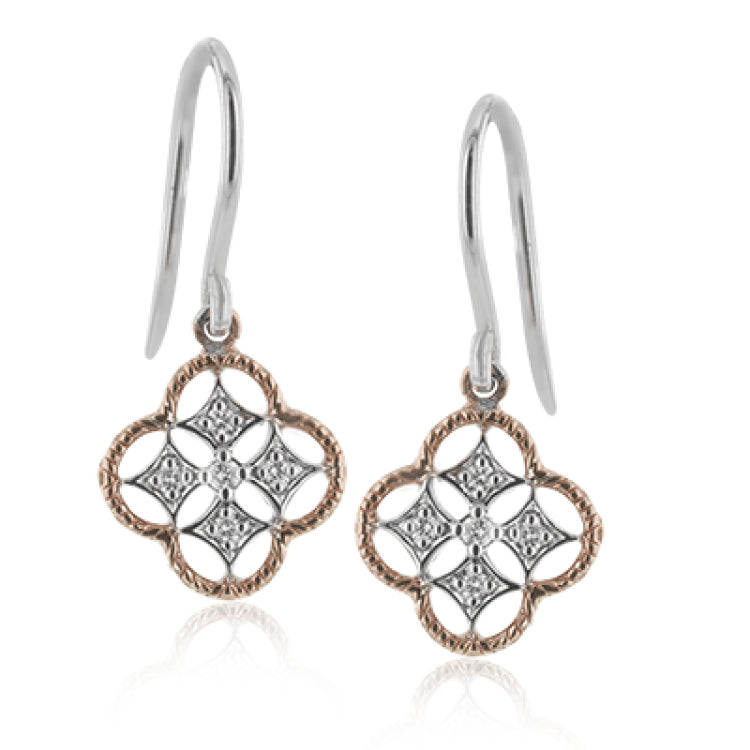 These earrings are perfect for everyday wear with a two-tone gold patterns set with .08 ctw of sparkling white diamonds.