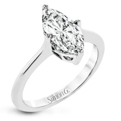 This solitaire ring design is built to perfectly showcase a beautiful marquise shaped center stone.