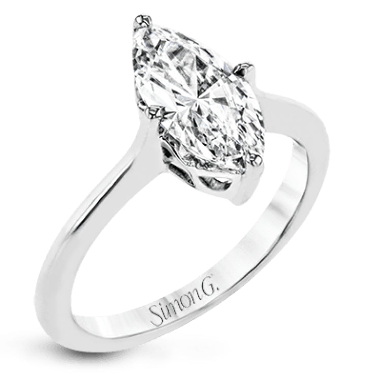 This solitaire ring design is built to perfectly showcase a beautiful marquise shaped center stone.