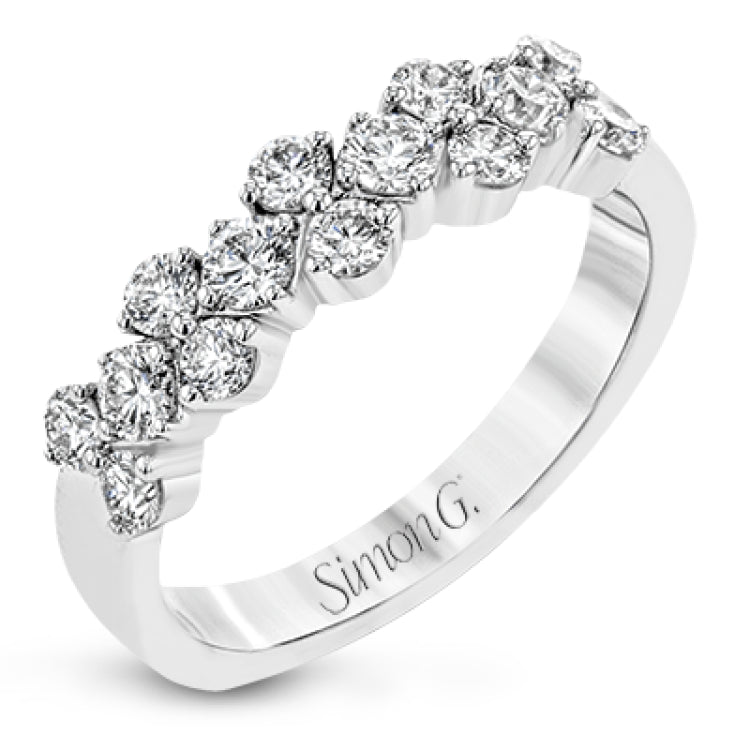 This ring features and expanse of .84 ctw of offset diamonds, creating a geometric look that can pair with any look.