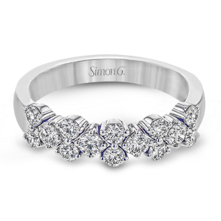 This ring features and expanse of .84 ctw of offset diamonds, creating a geometric look that can pair with any look.