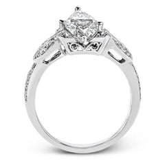 This amazing 18k white gold engagement ring features vintage-inspired design elements set with .28 ctw of white diamonds.