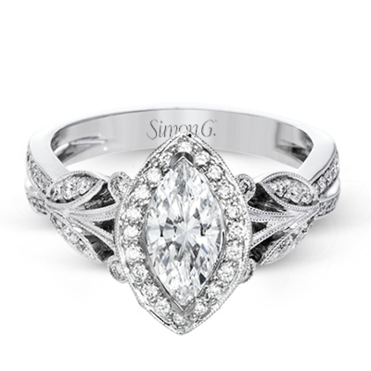This amazing 18k white gold engagement ring features vintage-inspired design elements set with .28 ctw of white diamonds.