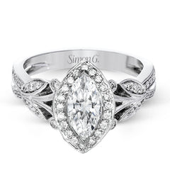 This amazing 18k white gold engagement ring features vintage-inspired design elements set with .28 ctw of white diamonds.