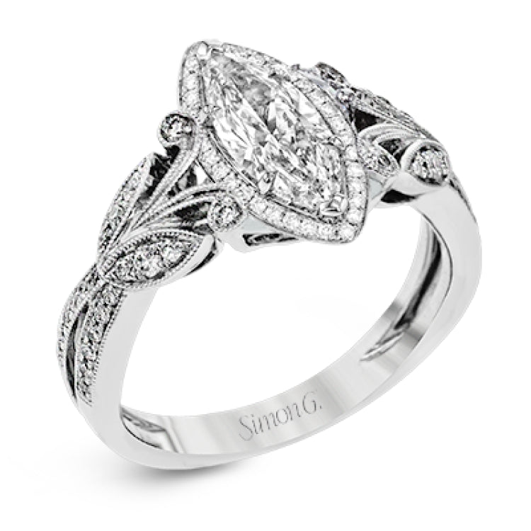 This amazing 18k white gold engagement ring features vintage-inspired design elements set with .28 ctw of white diamonds.
