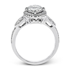 This amazing 18k white gold engagement ring features vintage-inspired design elements set with .28 ctw of white diamonds.