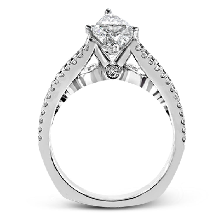 The lovely vintage style of this white gold engagement ring is further enhanced by .91 ctw of shimmering round cut diamonds.