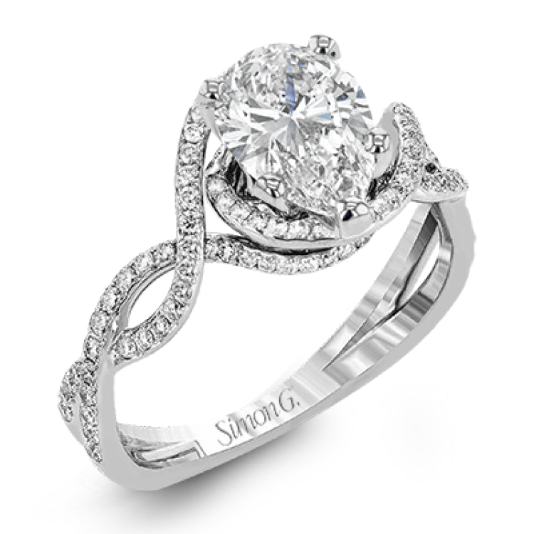 Classic with a modern twist, this white gold engagement ring features .50 ctw of sparkling white diamonds in a dramatic openwork design.