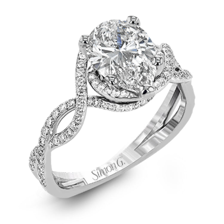 Classic with a modern twist, this white gold engagement ring features .50 ctw of sparkling white diamonds in a dramatic openwork design.
