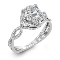 Classic with a modern twist, this white gold engagement ring features .50 ctw of sparkling white diamonds in a dramatic openwork design.