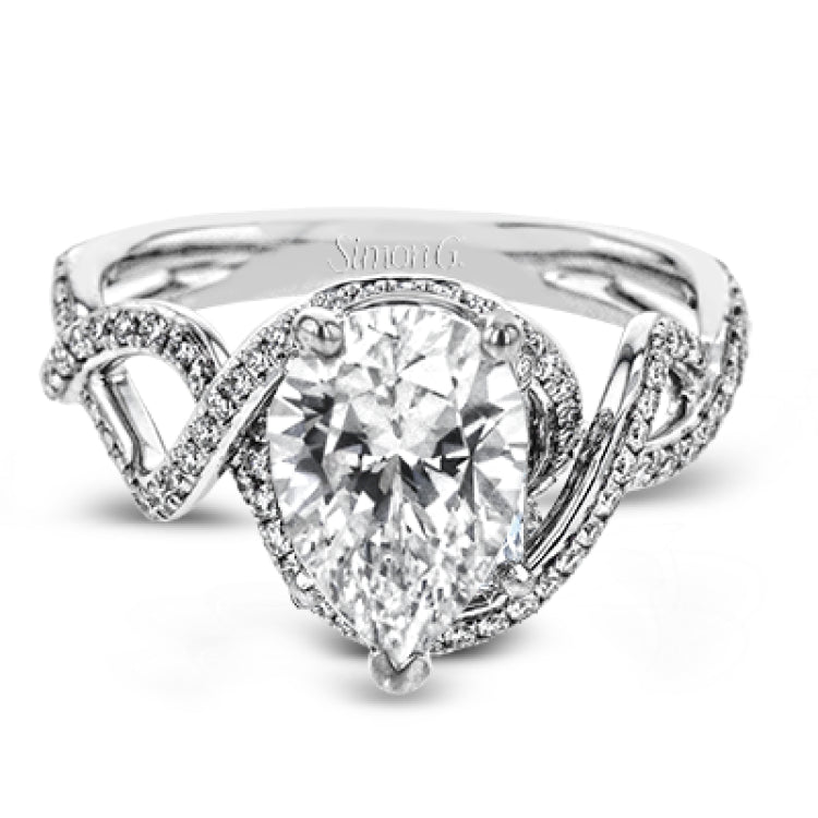 Classic with a modern twist, this white gold engagement ring features .50 ctw of sparkling white diamonds in a dramatic openwork design.