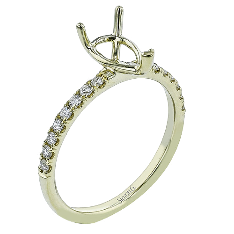 This distinctive bridal set design features a double-layer wedding band that fits around the engagement ring. The set contains .77 ctw of white diamonds.
