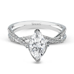 This sparkling modern white gold engagement ring and wedding band set features an eye-catching twisted design accented by .22 ctw of shimmering round cut white diamonds.