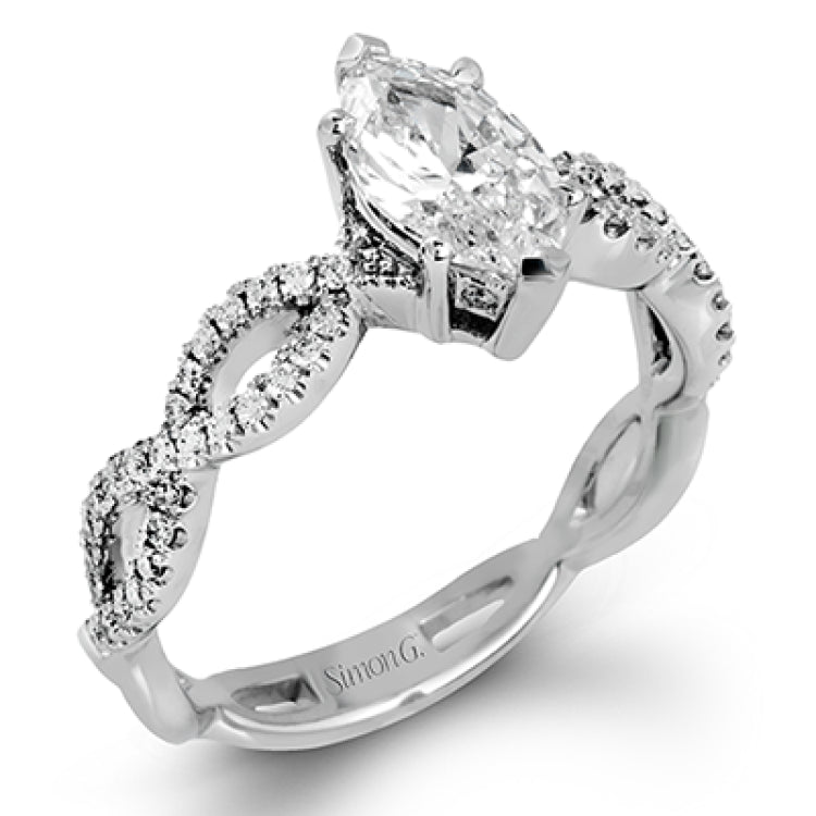 The intricate twisted design of this modern white gold engagement ring and wedding band set is set with .65 ctw of striking round cut white diamonds.