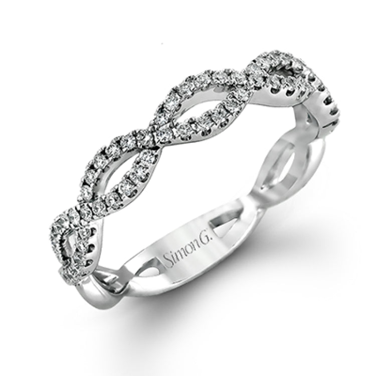 The intricate twisted design of this modern white gold engagement ring and wedding band set is set with .65 ctw of striking round cut white diamonds.