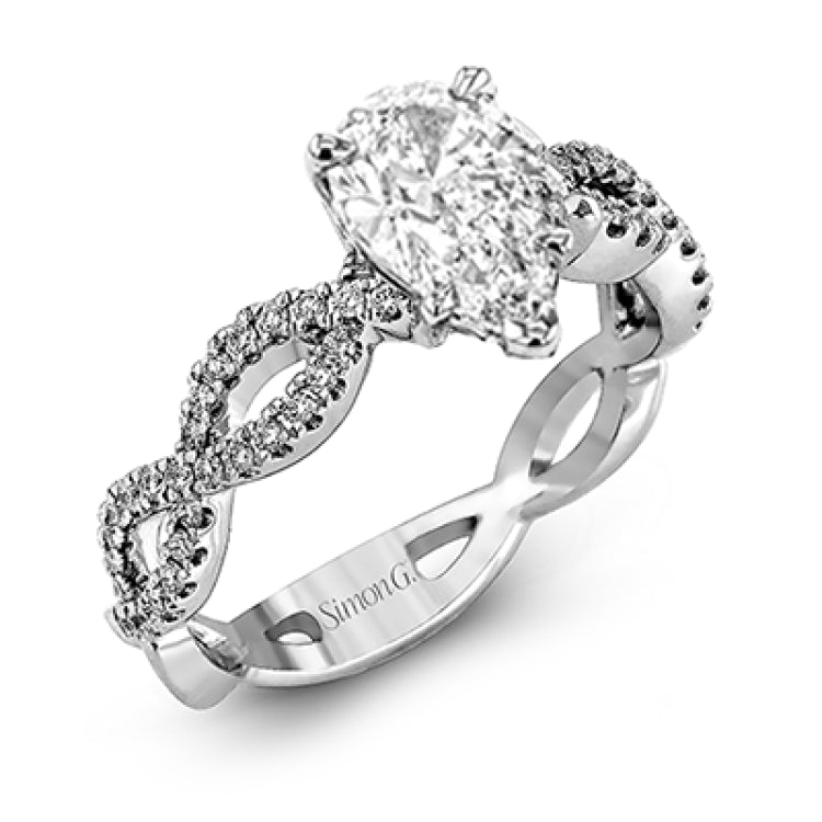 The intricate twisted design of this modern white gold engagement ring and wedding band set is set with .65 ctw of striking round cut white diamonds.