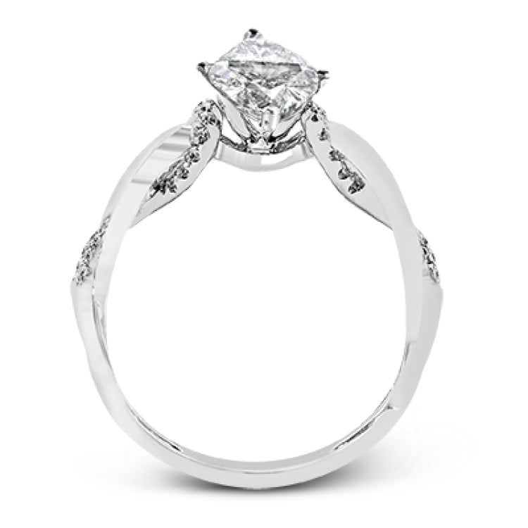 This impressive contemporary white engagement ring features a unique twisting design on the shank, which is complemented by .17 ctw of round cut white diamonds.