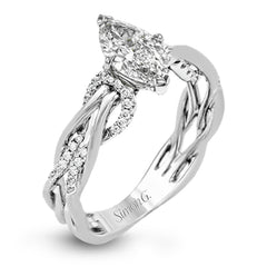 This impressive contemporary white engagement ring features a unique twisting design on the shank, which is complemented by .17 ctw of round cut white diamonds.
