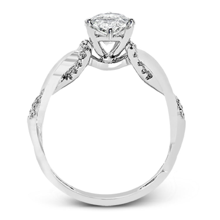 This impressive contemporary white engagement ring features a unique twisting design on the shank, which is complemented by .17 ctw of round cut white diamonds.