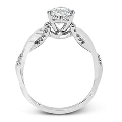 This impressive contemporary white engagement ring features a unique twisting design on the shank, which is complemented by .17 ctw of round cut white diamonds.